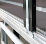 The optional aluminum exterior frame with special SOMMER stanchion mount alows the sliding stanchions to be fixed at any point.
